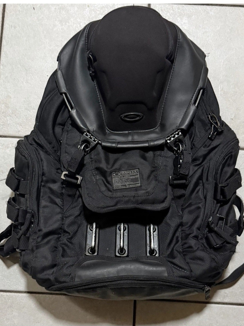 Oakley Kitchen Sink Backpack, specifically in the Stealth Black w MOLLE Straps